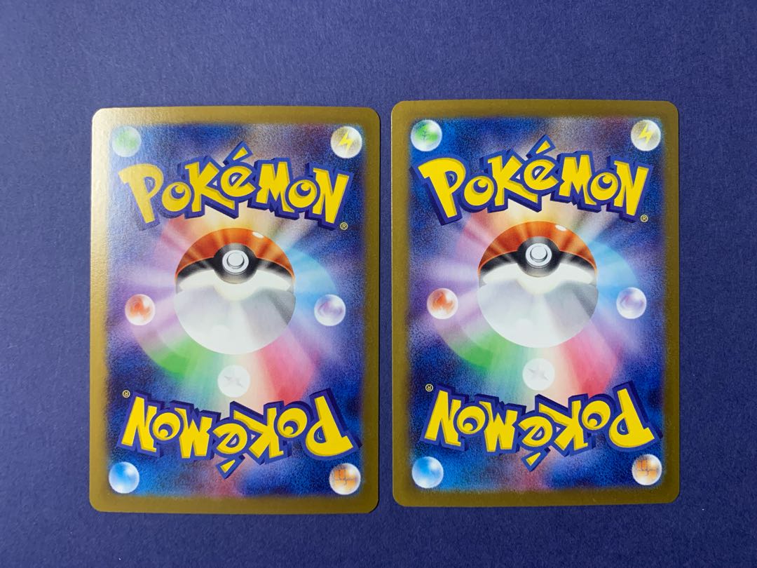 four flat objects (e.g. tickets, pieces of cloth, etc.) Pikachuex RR 033/106