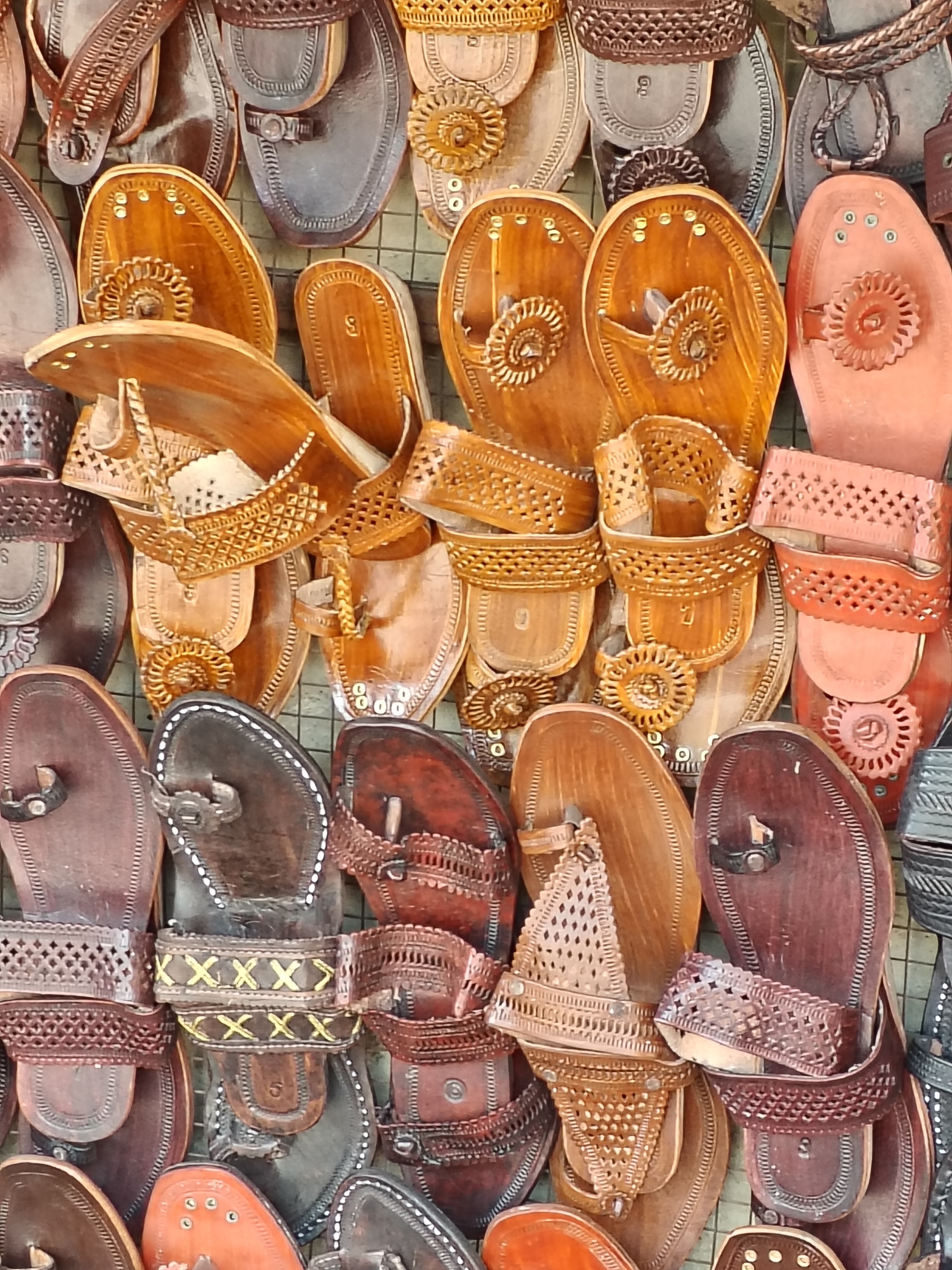 Kolhapuri chappals at a roadside stall - similar to Tulsi Baug's outer footwear lanes