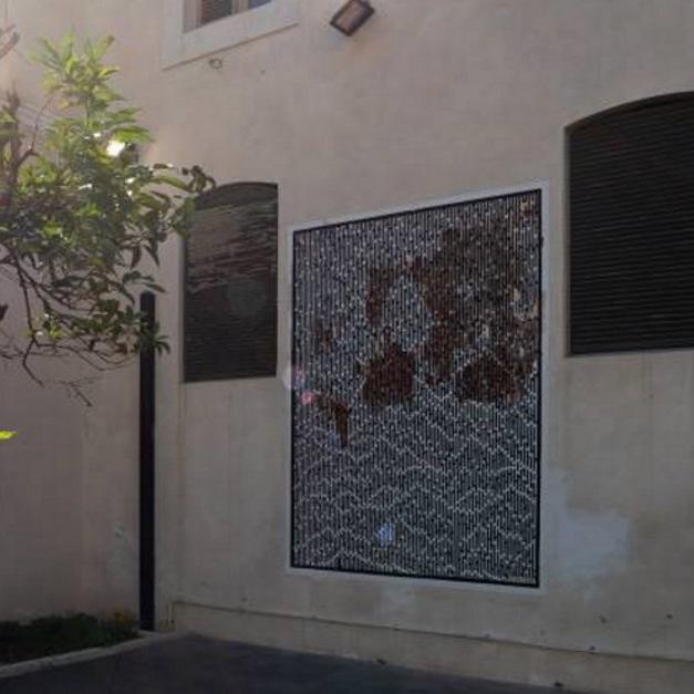 StenLex. Rinascita - Intervento artistico site specific e stendardo urbano