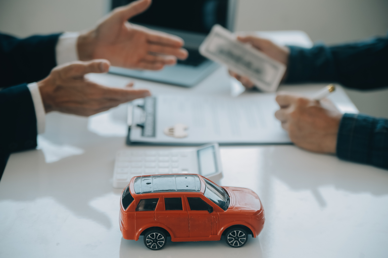 closeup-asian-male-people-car-salesman-sales-manager-offers-sell-car-explains-reads-terms-signing-car-contract-insurance.jpg