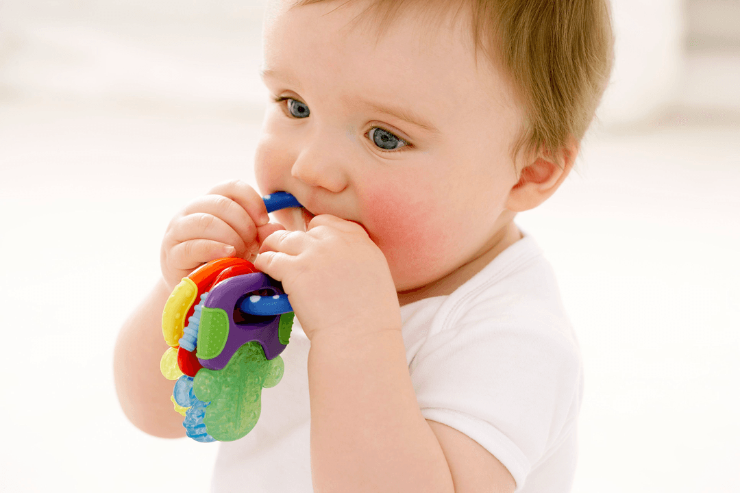 baby-boy-chewing-on-teething-ring-85771297-5c15afdec9e77c000186e8bb.jpg