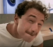 A confused golden retriever giving side eye.