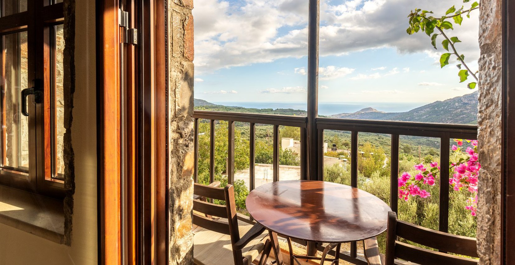 The view of the Malles mountains and the sea from the balcony of the "Thyme" residence of Mala Villa