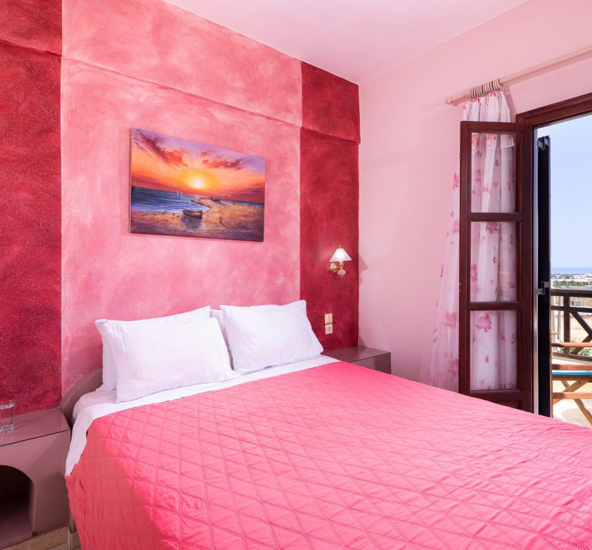 Mandilaria Studios, Bedroom with double bed and balcony