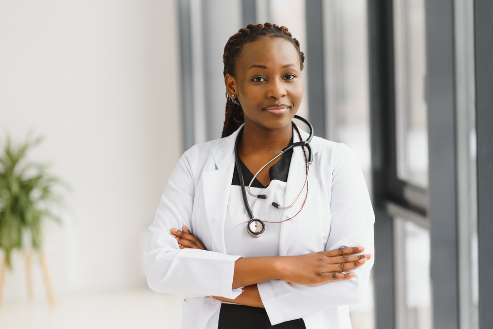 African american doctor with her arms folded