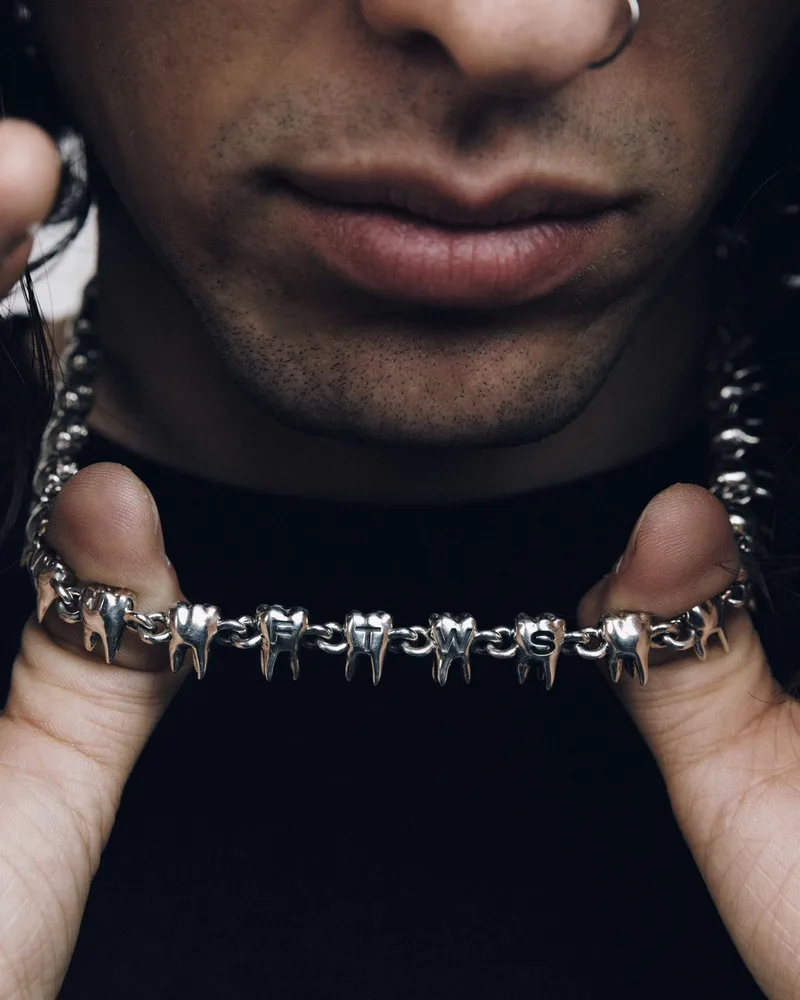 CROOKED SMILE NECKLACE