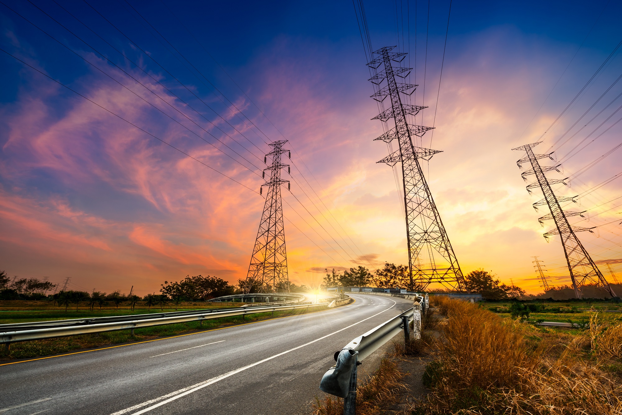 Deregulation header image powerlines in sunset