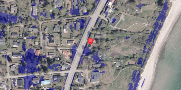 Ekstrem regn på Kystvejen 138, 8300 Odder
