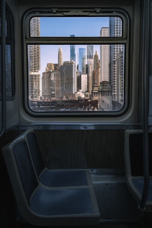 Chicago cityscape along the Chicago River - Aus The CTA L train crossing the river at Wells St. looking east, United States