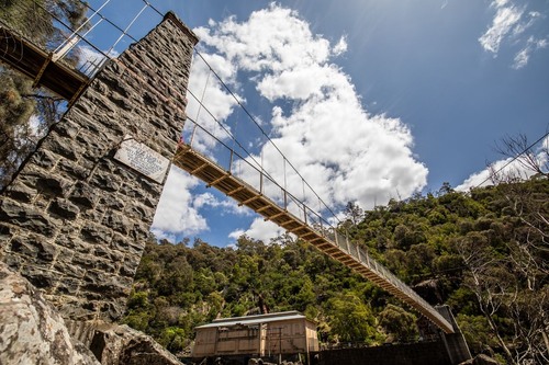 Suspension Bridge to Duck Reach Power Station - Aus Riverbank South Esk River, Australia