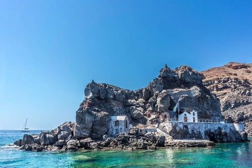 Ákra Ágios Nikólaos - От Boat, Greece