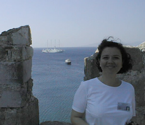 This is our tour guide, Inci, from the castle. In the distance is our ship.