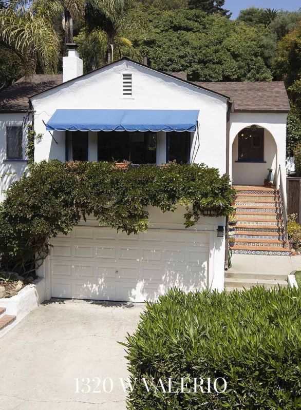 front exterior with garage and stairs