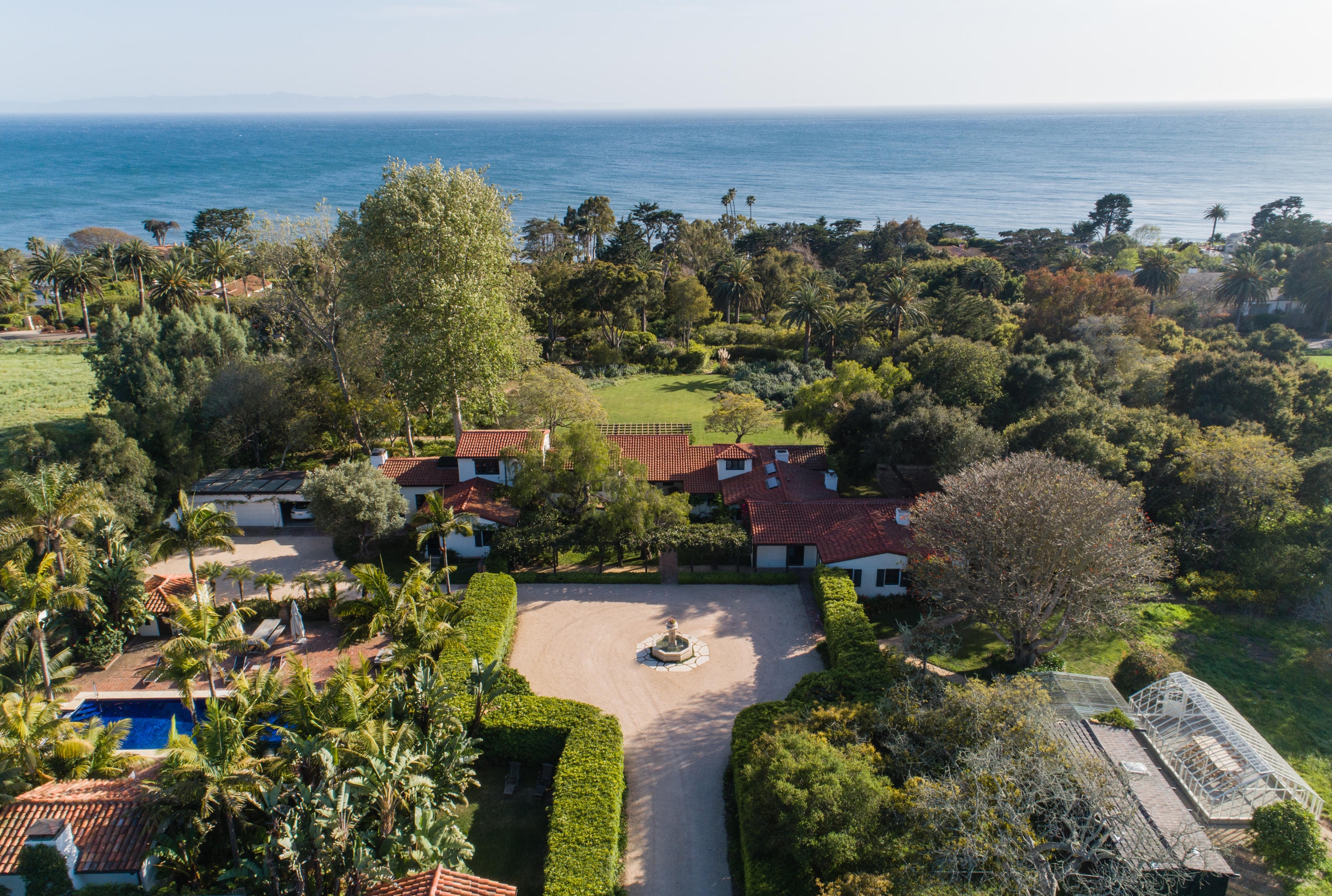 aerial view of property and ocean