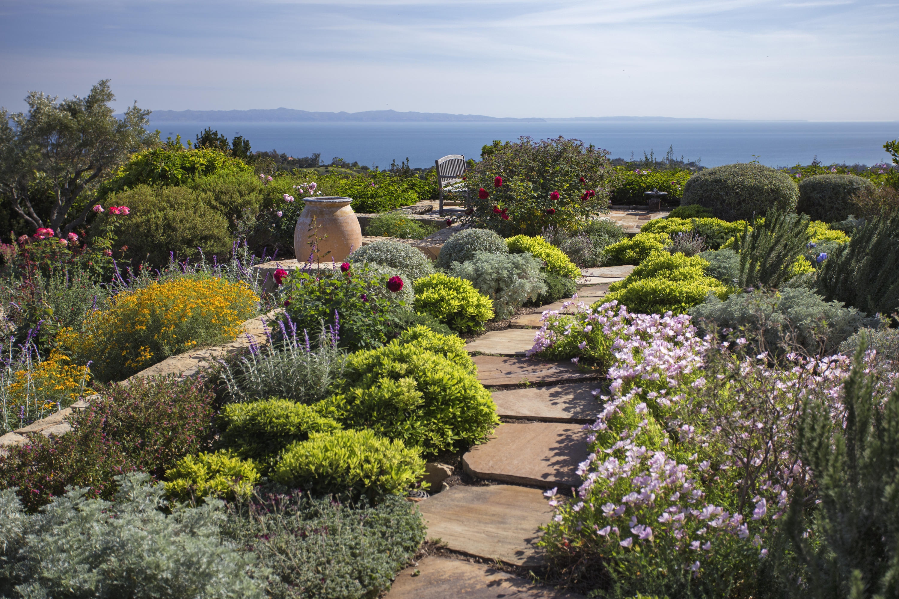 stone walkway with view of ocean