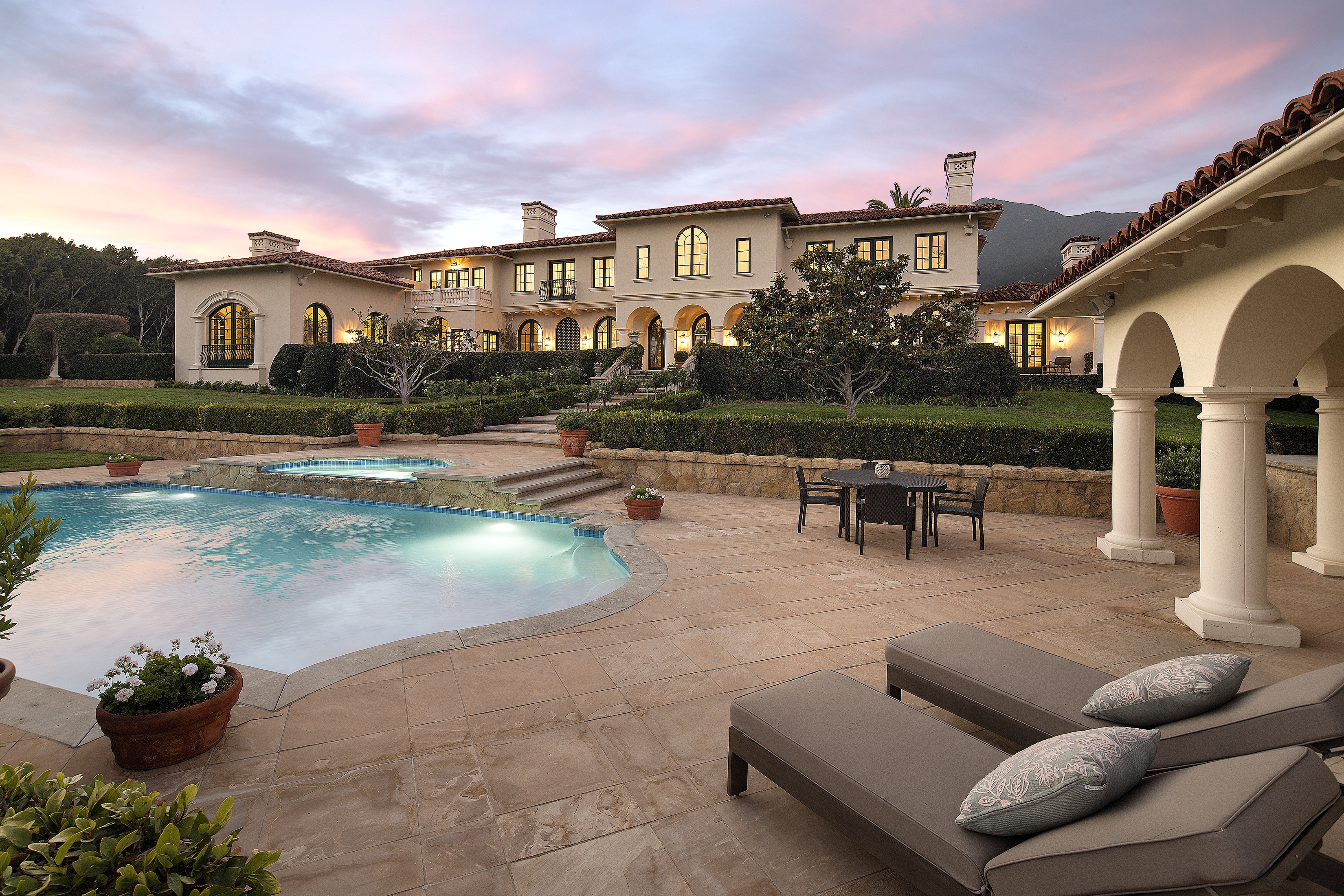 pool and poolhouse with view of main house