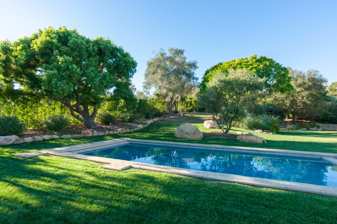 pool surrounded by grass