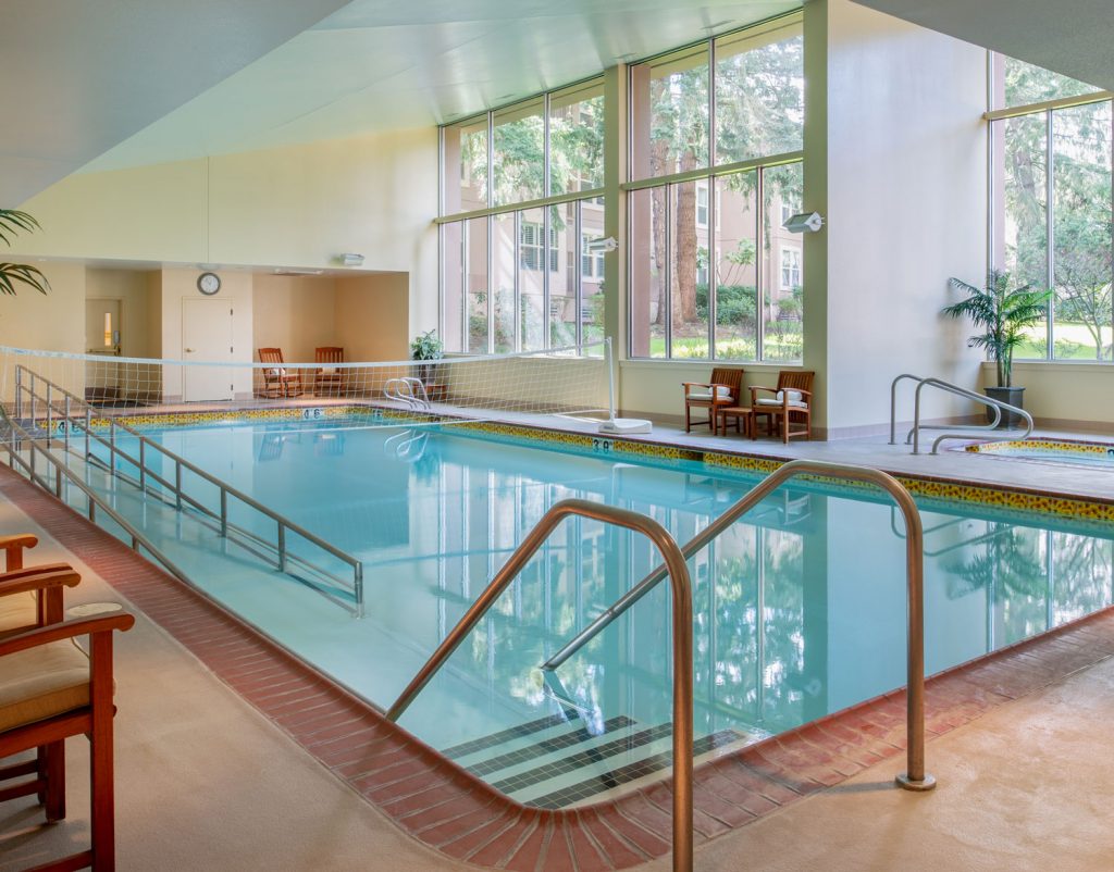indoor pool area with volleyball net