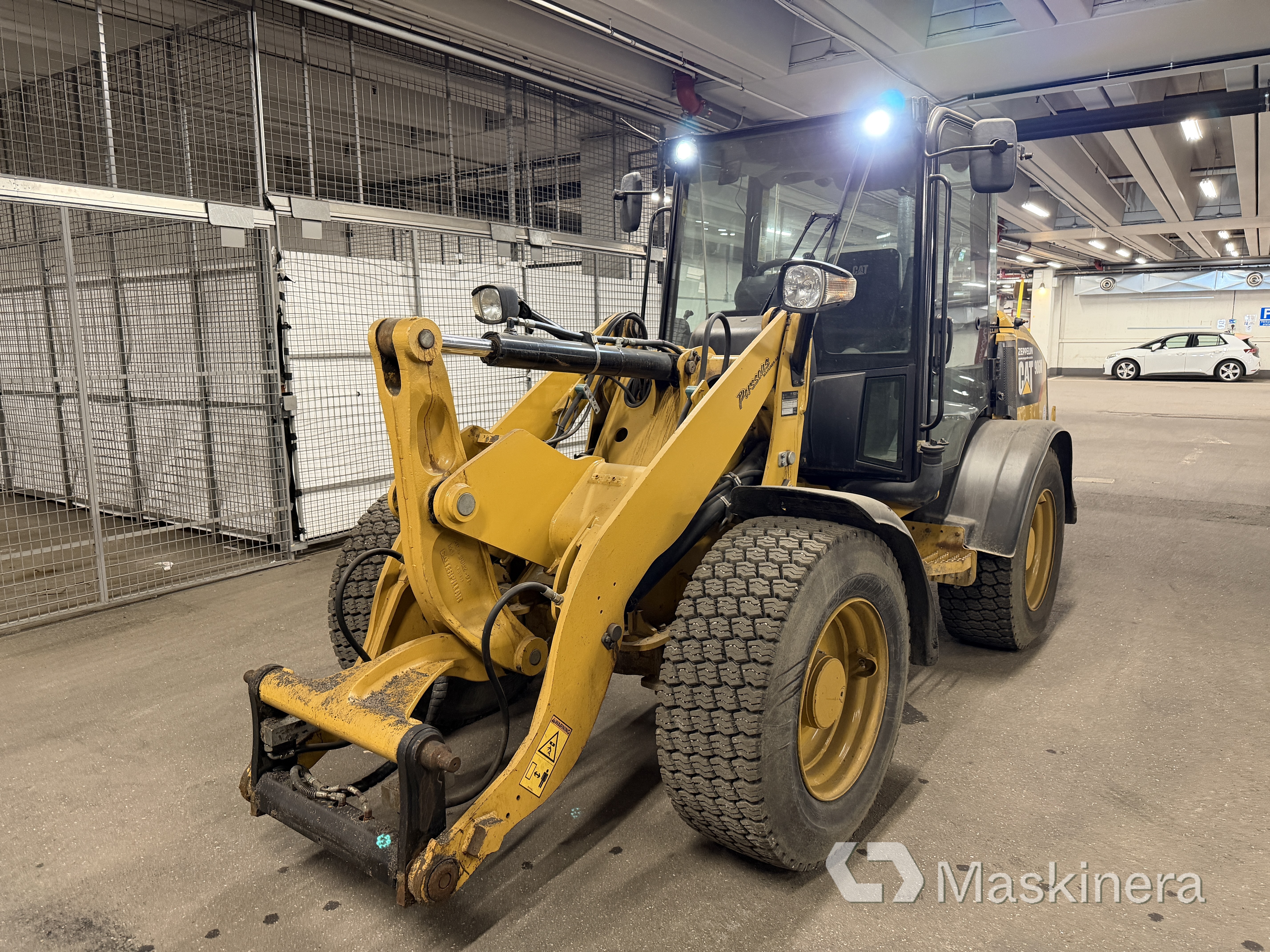 Hjullastare CAT 906M med tillbehör