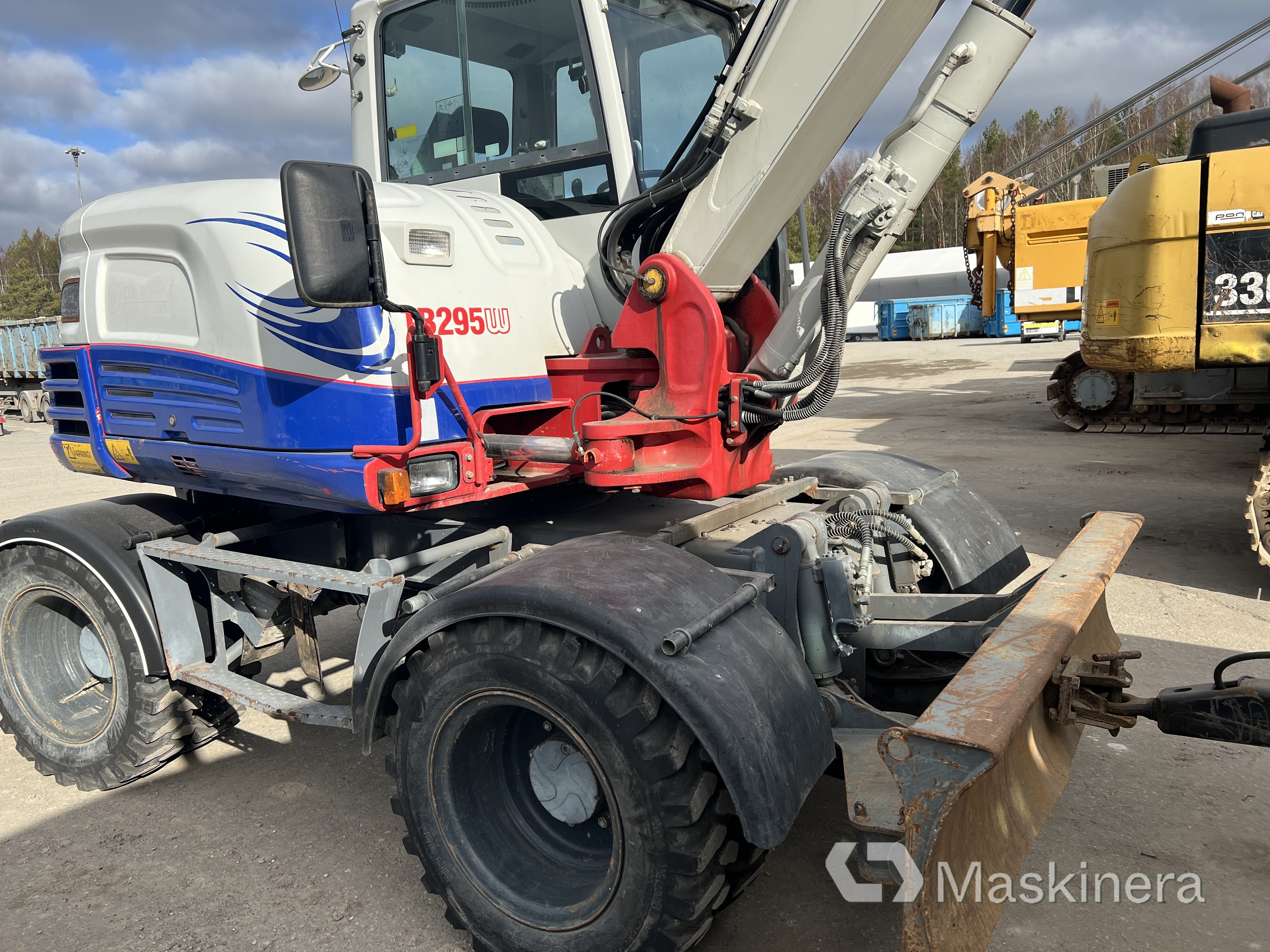 Hjulgrävare Takeuchi TB295W med tillbehör