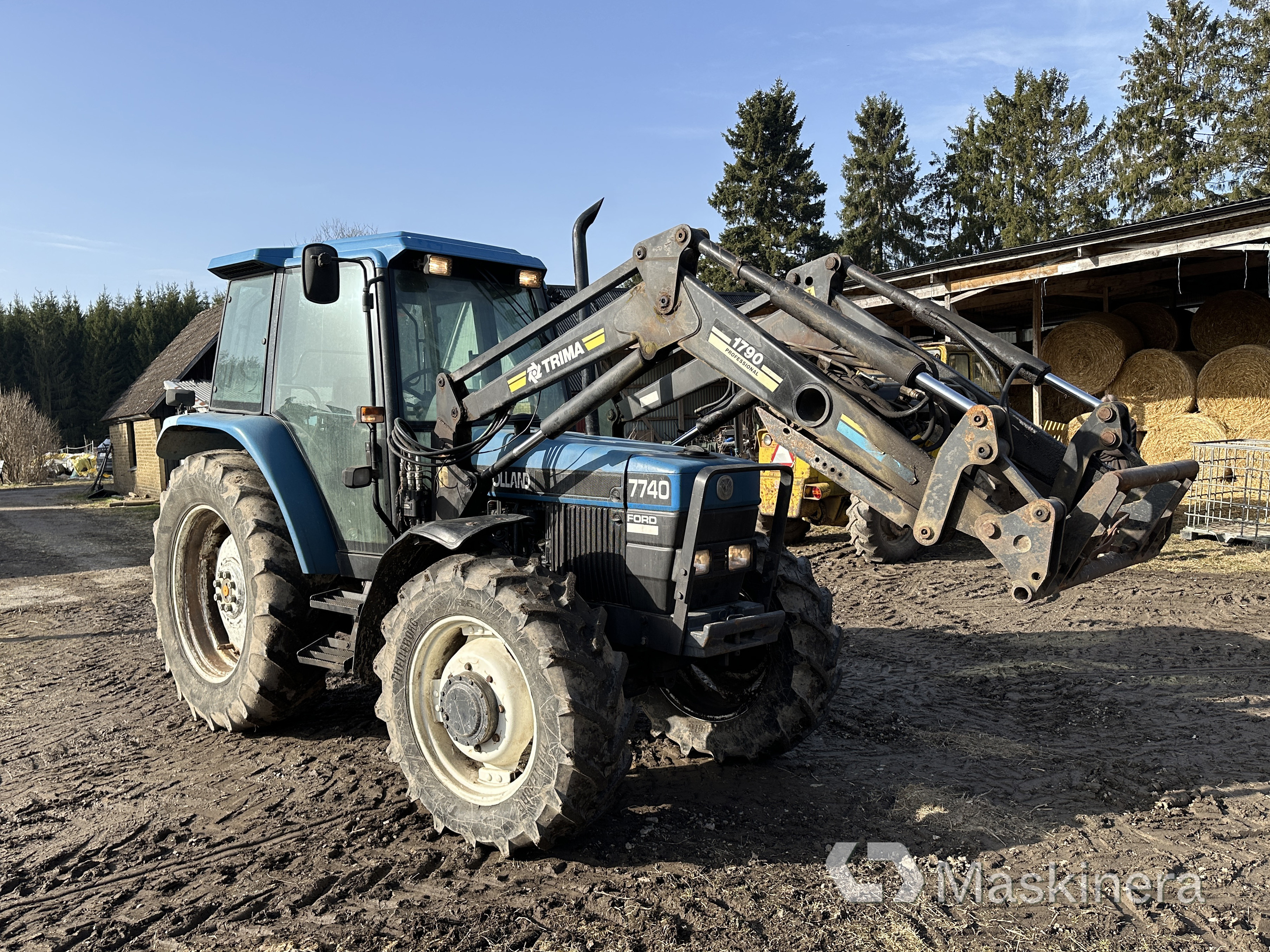 Begagnad Traktor New Holland 7740 + Frontlastare auktion | Maskinera
