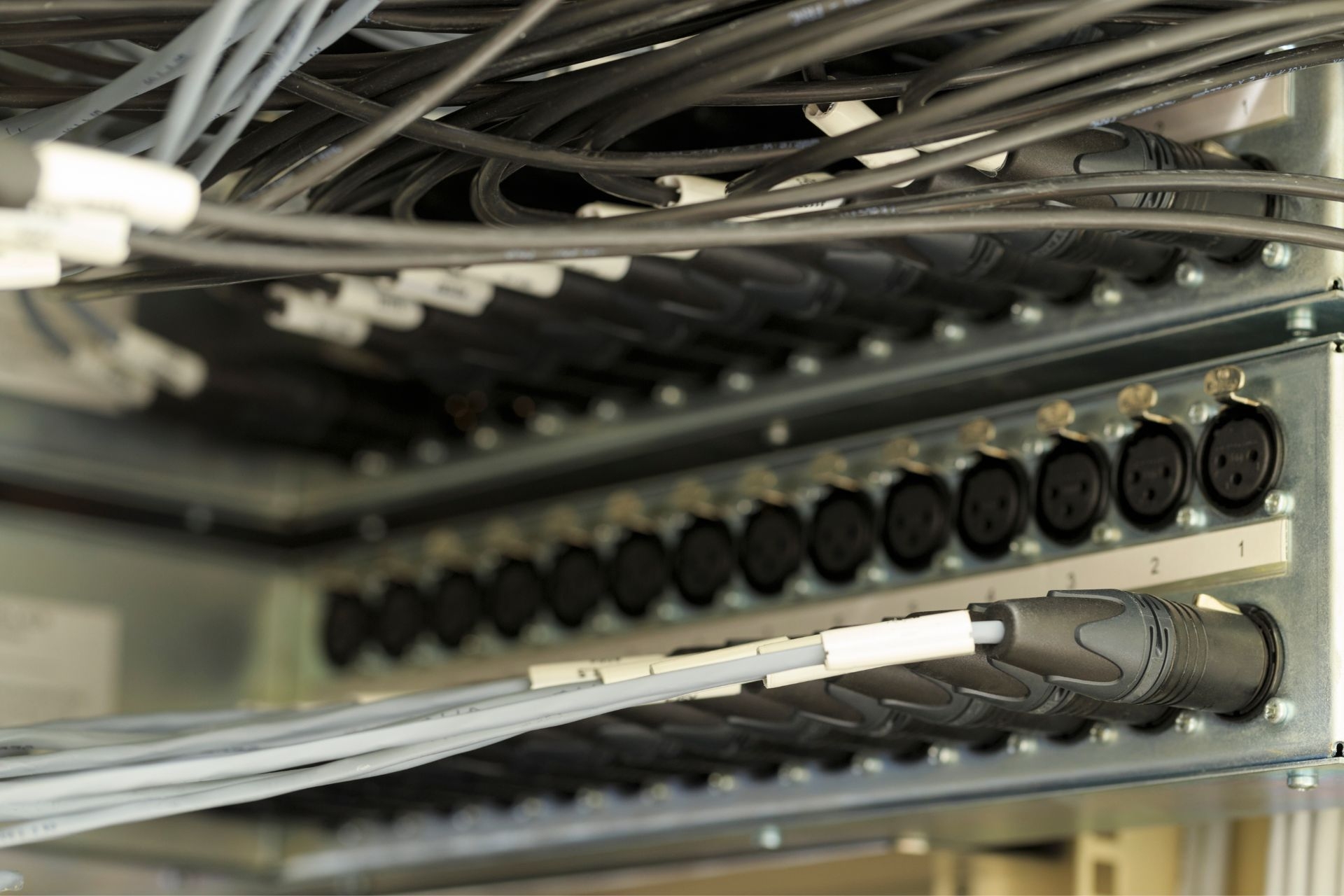 Can corner-fit AV racks accommodate different types of audiovisual equipment?