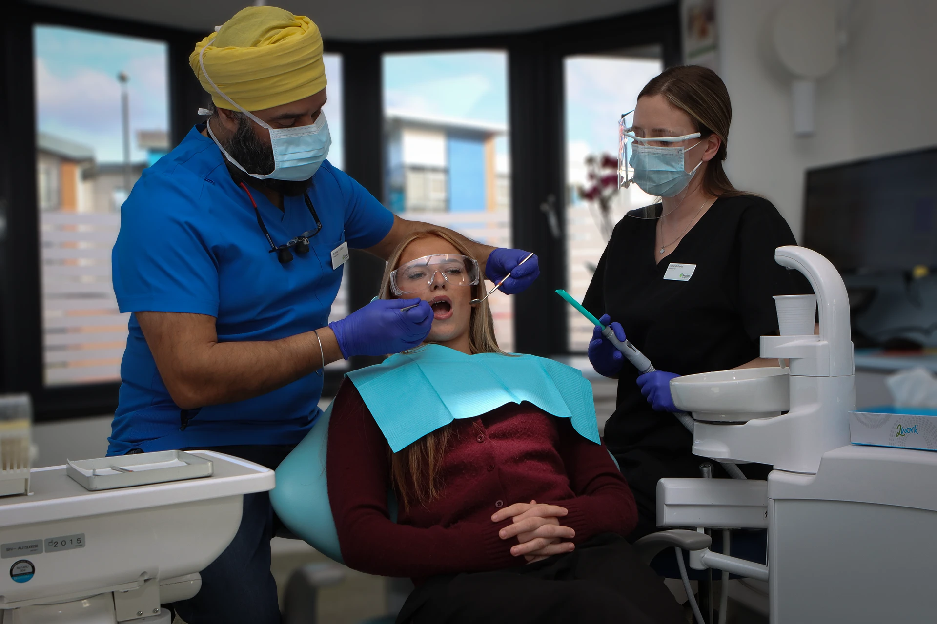 Maypole dental clinicians performing a comprehensive denture assessment and treatment planning.