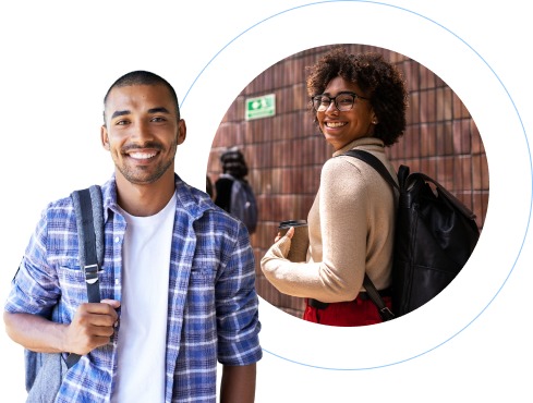 Two students on a campus, shown in a circular frame with a blue border. On the left, a smiling individual wearing a blue and white plaid button-up shirt and white undershirt stands confidently. On the right, another student with curly hair and glasses looks over their shoulder, wearing a beige sweater and red skirt, with a black backpack. The background appears to be a brick wall with a green emergency exit sign, suggesting an educational setting. Both subjects look happy and engaged, representing a diverse, welcoming academic environment.