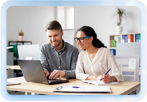 Comparison of two framed hero images for Google Career Certificates layout showing a professional pair collaborating at a desk on a laptop with notebooks and office background used to evaluate border frame styles rounded corners soft blue glow and subtle shadow