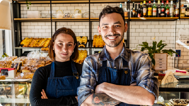 Portrait of bakery owners couple