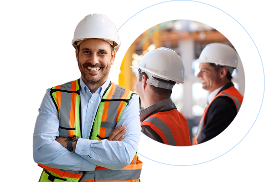 Project management workers at construction site wareing hard hats