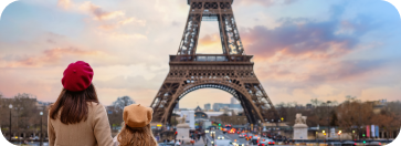 Mother with her child at the Eiffel Tower in Paris
