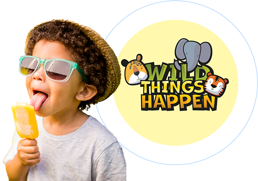 Graphic featuring a young curly-haired boy in a white t-shirt, sunglasses, and a straw hat licking a yellow ice pop. To his right, a circular yellow logo reads "Wild Things Happen"