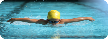 Young swimmer in a pool