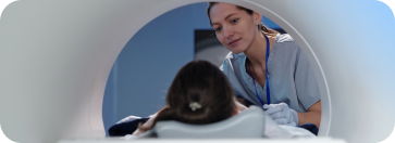 An MRI technician with a patient