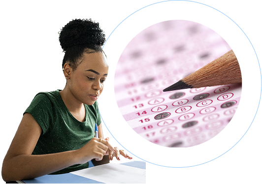 A young student with curly hair pulled up, wearing a dark green t-shirt, concentrates while filling out a standardized test answer sheet. On the right side of the image, a circular inset shows a sharp pencil hovering over a pink-toned multiple-choice exam form with numbered rows and circles. The scene suggests an academic testing environment, with careful attention and precision. Soft blue and white background elements frame the composition, creating a clean, focused visual that emphasizes academic preparation and testing.