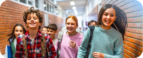 Group of older kids walking to their classroom