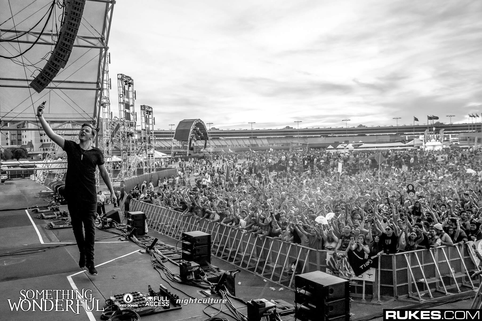 sam feldt taking a selfie on stage at something wonderful festival