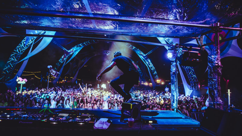 DJ on stage at something wicked festival