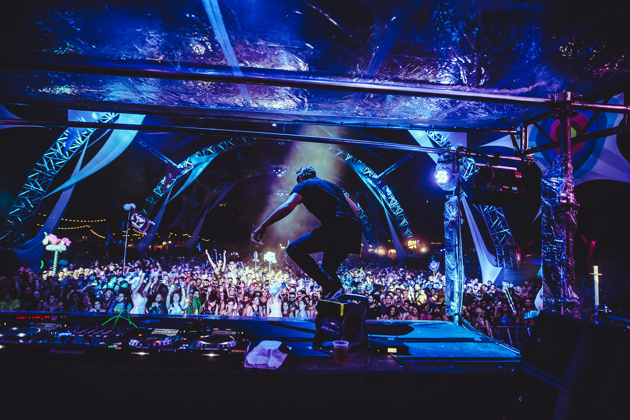 DJ on stage at something wicked festival