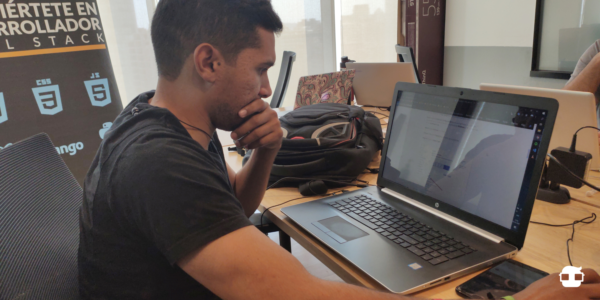 man-in-front-of-a-computer-studying-at-a-online-bootcamp.jpg