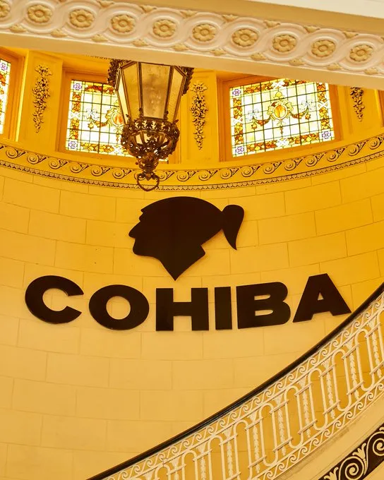 Cohiba brand signage featuring the Taíno head logo
