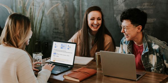 News Tagging Guide: Three People collaborating on their laptops