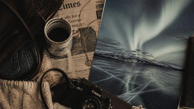 a sweeping aurora over a frozen lake, no people — Downtown Girl Aesthetic wallpaper