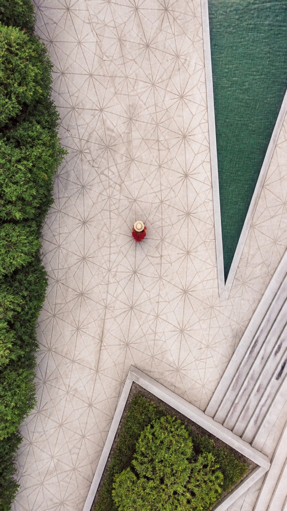full-length portrait of an elegant figure — Aerial Drone Photography Style