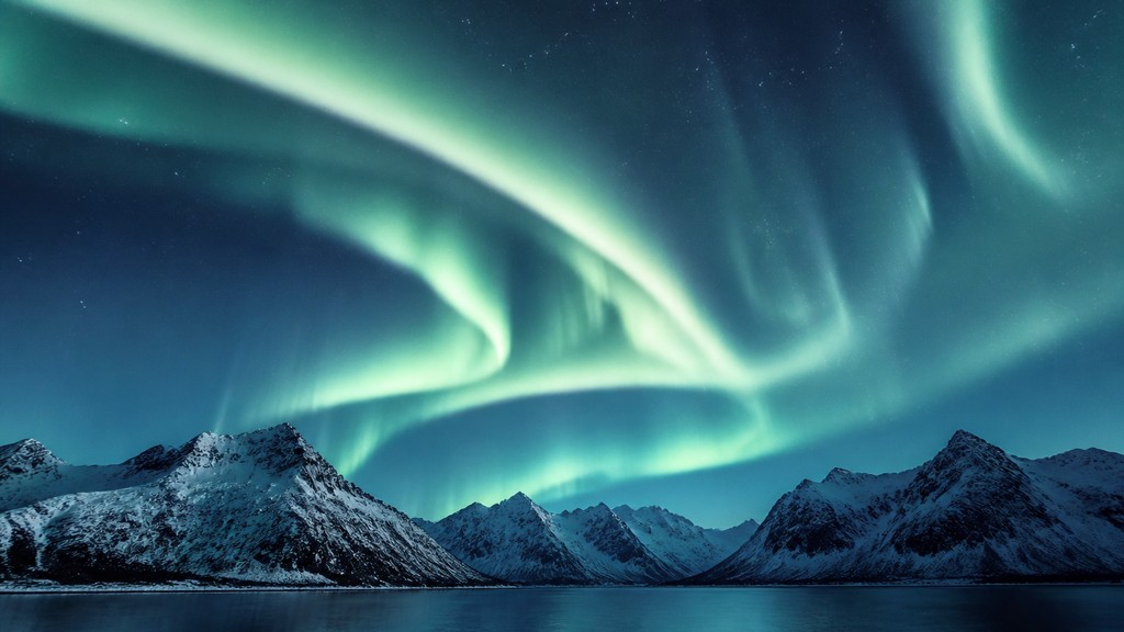 a flowing aurora over snowy peaks, wide sweeping composition, no people, no text — Parisian Chic Fashion Style banner