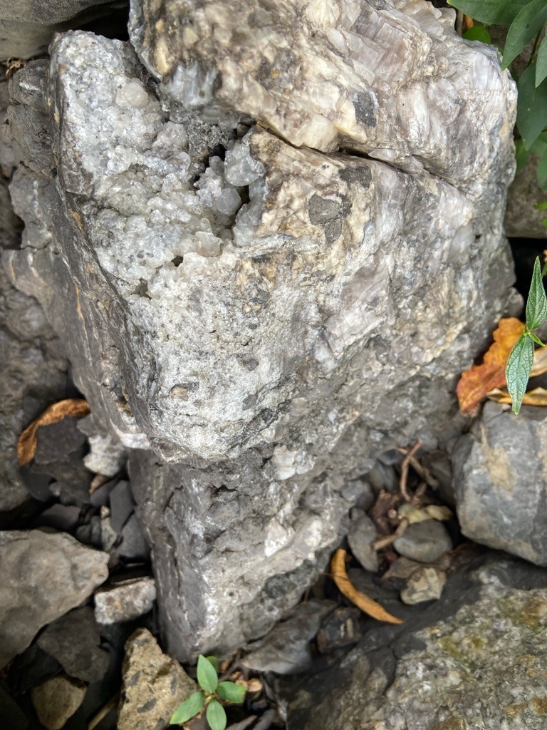 Not a diamond (Raw mineral matrix containing quartz crystals or druzy quartz formations) - Rough, uncut mineral cluster / Irregular natural aggregate