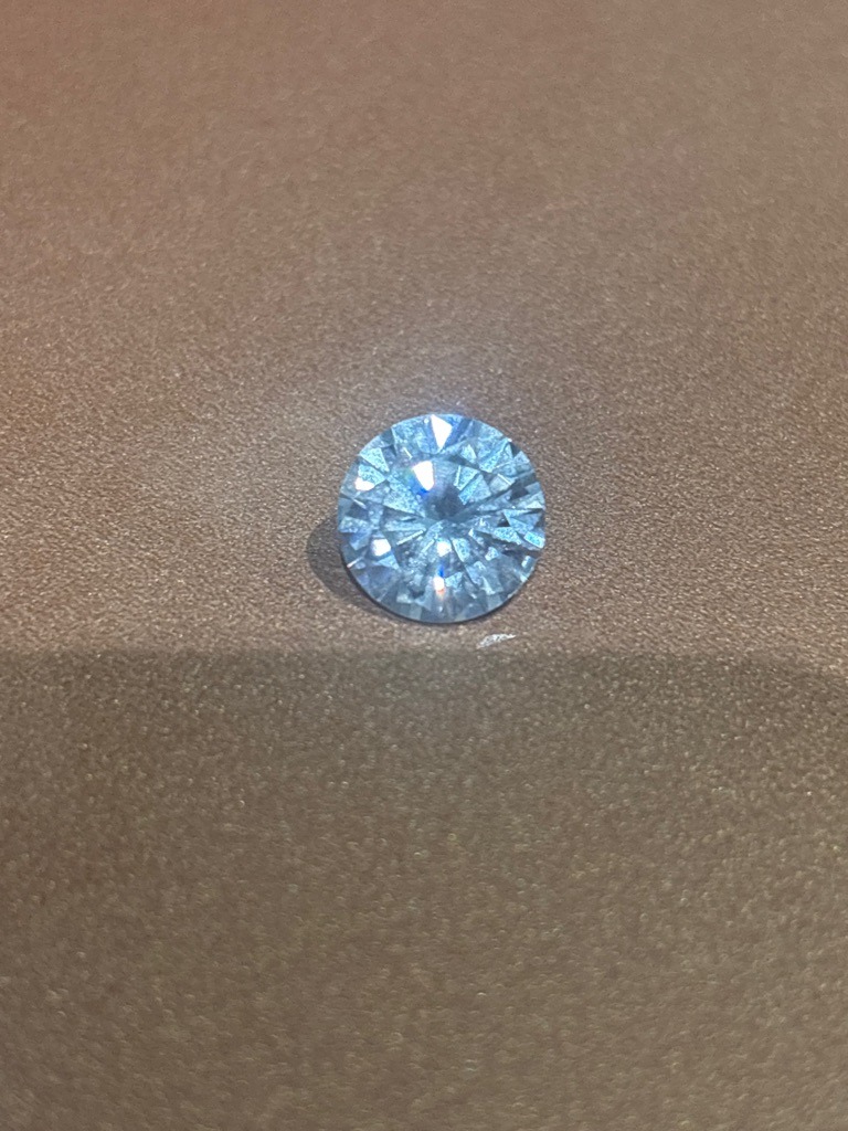 Natural or Lab-Grown Diamond (Visual inspection cannot definitively separate without advanced spectroscopic equipment like FTIR or Photoluminescence, though HPHT/CVD lab-grown origin is highly probable in modern market contexts) - Round Brilliant
