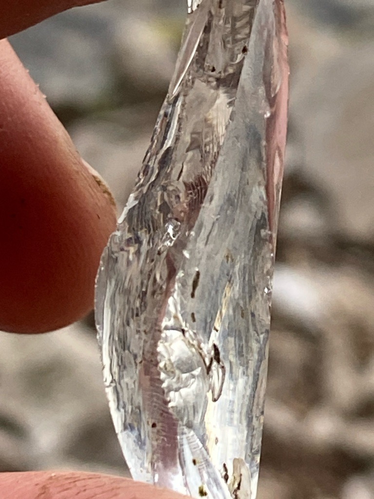 Natural rough crystal / mineral specimen (appears to be quartz or glass rather than gemstone diamond due to irregular conchoidal fracture and surface striations, but analyzed provisionally) - Rough uncut crystal / irregular elongated fragment
