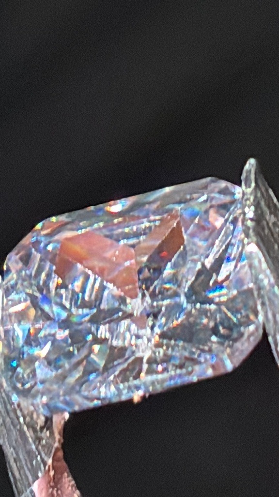 Likely Diamond Simulant (e.g., Cubic Zirconia or Moissanite) - Emerald / Radiant Hybrid Cut